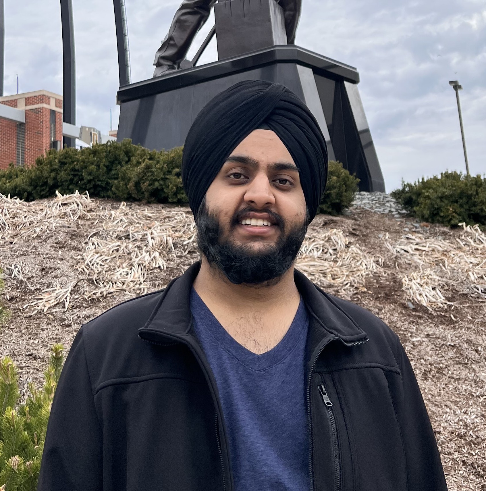 A photo of Tarandeep Singh standing outside