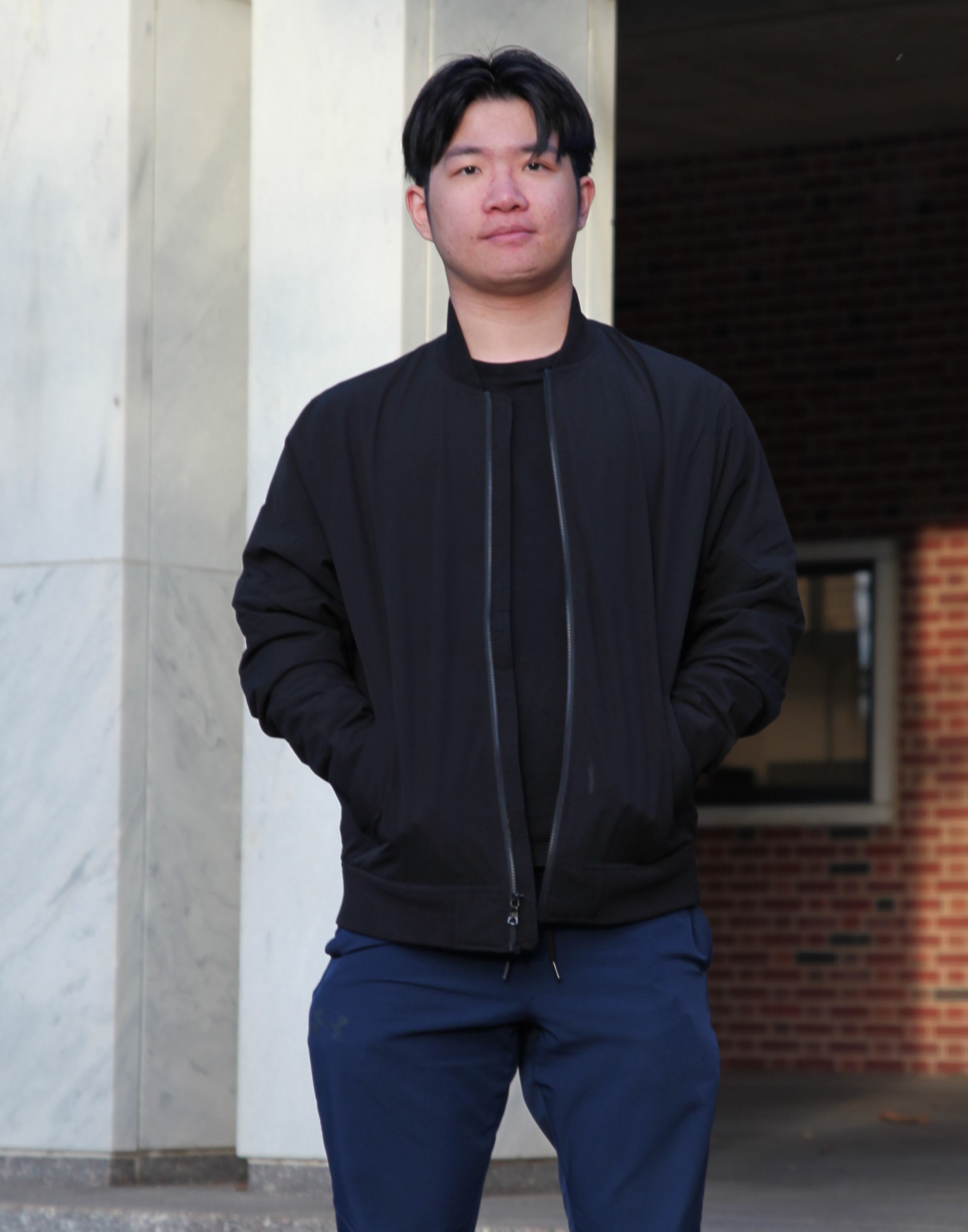 Bill Huang standing in from of the Materials Research Lab building.