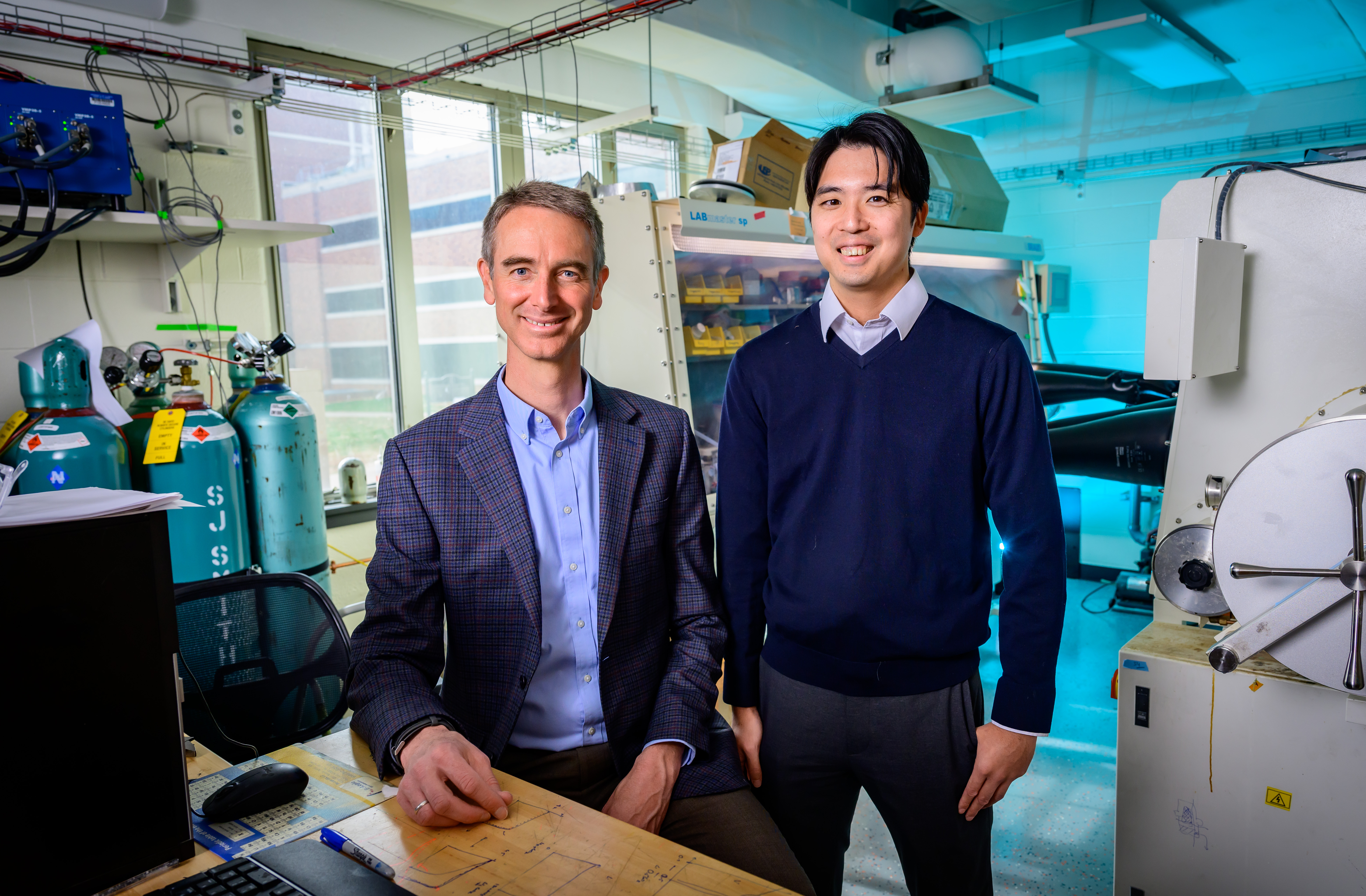 A photo of Paul Braun and Yasunori Abe