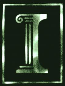 Photograph of the mechano- luminescence of N-acetyl- anthranilic acid crystals in the shape of the UI emblem crushed between two transparent windows.
