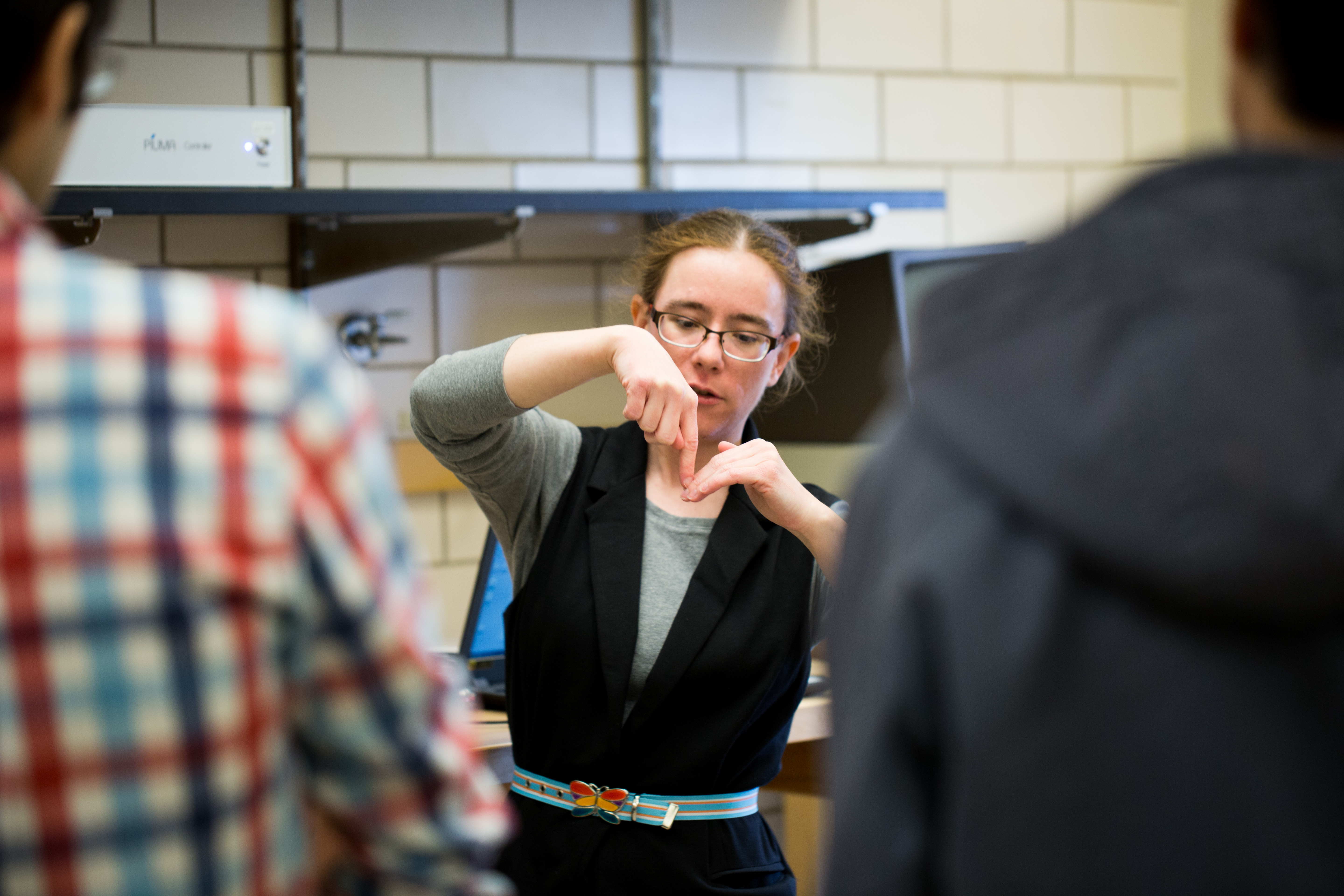 Senior research scientist Kathy Walsh explains how to use an instrument